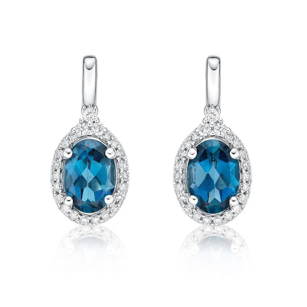 Oval London Blue Topaz and 1 4ctw Diamond White Gold Earrings