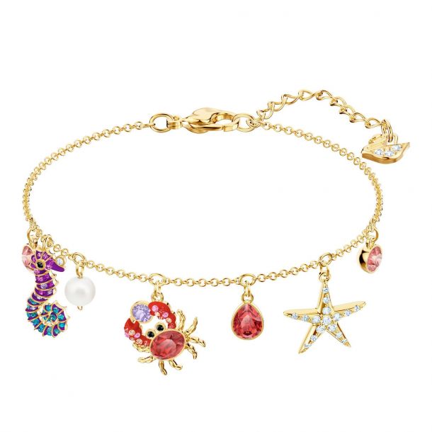 Swarovski Crystal Ocean Gold Tone Charm Bracelet REEDS Jewelers