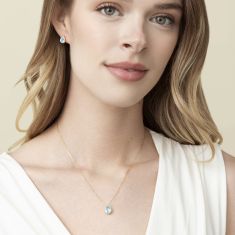 Downton Abbey Cora Grantham - Pear Blue Topaz and 1/10ctw Diamond 10k Yellow Gold Pendant Necklace