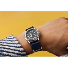 Caravelle by Bulova Vintage Light Up Quartz Blue Dial Fabric Strap Watch 39mm - 43C126
