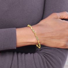 Oval Peridot and Diamond Accent 14k Yellow Gold Wavy Link Bracelet