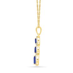 Created Blue Sapphire and 1/6ctw Diamond 10k Yellow Gold Three-Stone Pendant Necklace
