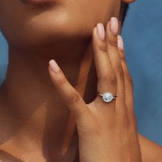 Aquamarine and 1/20ctw Diamond Halo Sterling Silver Ring