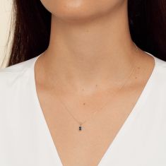 Oval Blue Sapphire and Diamond Accent Yellow Gold Pendant Necklace