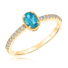 Oval Swiss Blue Topaz and 1/6ctw Diamond Yellow Gold Ring