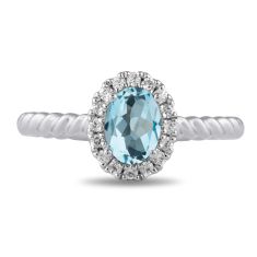 Oval Swiss Blue Topaz and 1/6ctw Lab Grown Diamond Halo White Gold Ring