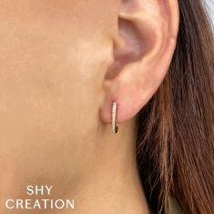Shy Creation 1/15ctw Diamond Yellow Gold Oval Hoop Earrings