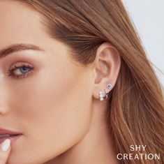 Shy Creation Blue Sapphire and 1/15ctw Diamond White Gold Halo Earrings