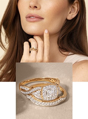 Woman wearing stacked yellow gold Ellaura bridal rings and a cushion-cut yellow gold engagement ring with matching diamond bands