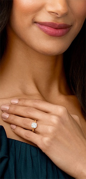 Woman wearing an ECONIC Star lab-grown diamond engagement ring