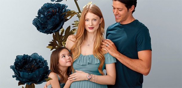 Personalized Jewelry for the Whole Family Family wearing personalized jewelry styles for women, men, and children