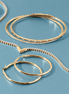 Shop Diamond Gold Jewelry at REEDS Gold hoop earrings, tennis necklace with geo shaped and diamond accent bangles