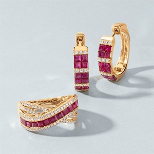 Magenta gemstone earrings and ring in gold settings for cool toned complexions