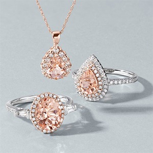 Pale pink gemstone pendant and rings complementing cool skin tones