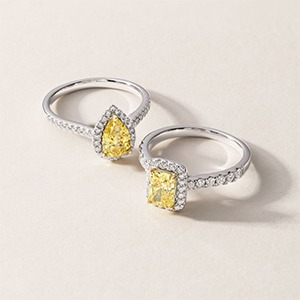 Yellow gemstone pear-shaped rings with diamond accents for warm toned complexions
