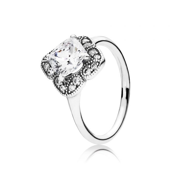 NRG Rings Stainless Steel Gold Color Plated Prong-Set Round Sirena Bypass Fancy Ring with Clear CZ