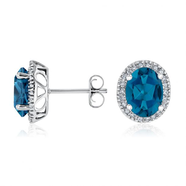 Oval London Blue Topaz and Diamond White Gold Stud Earrings 1/6ctw